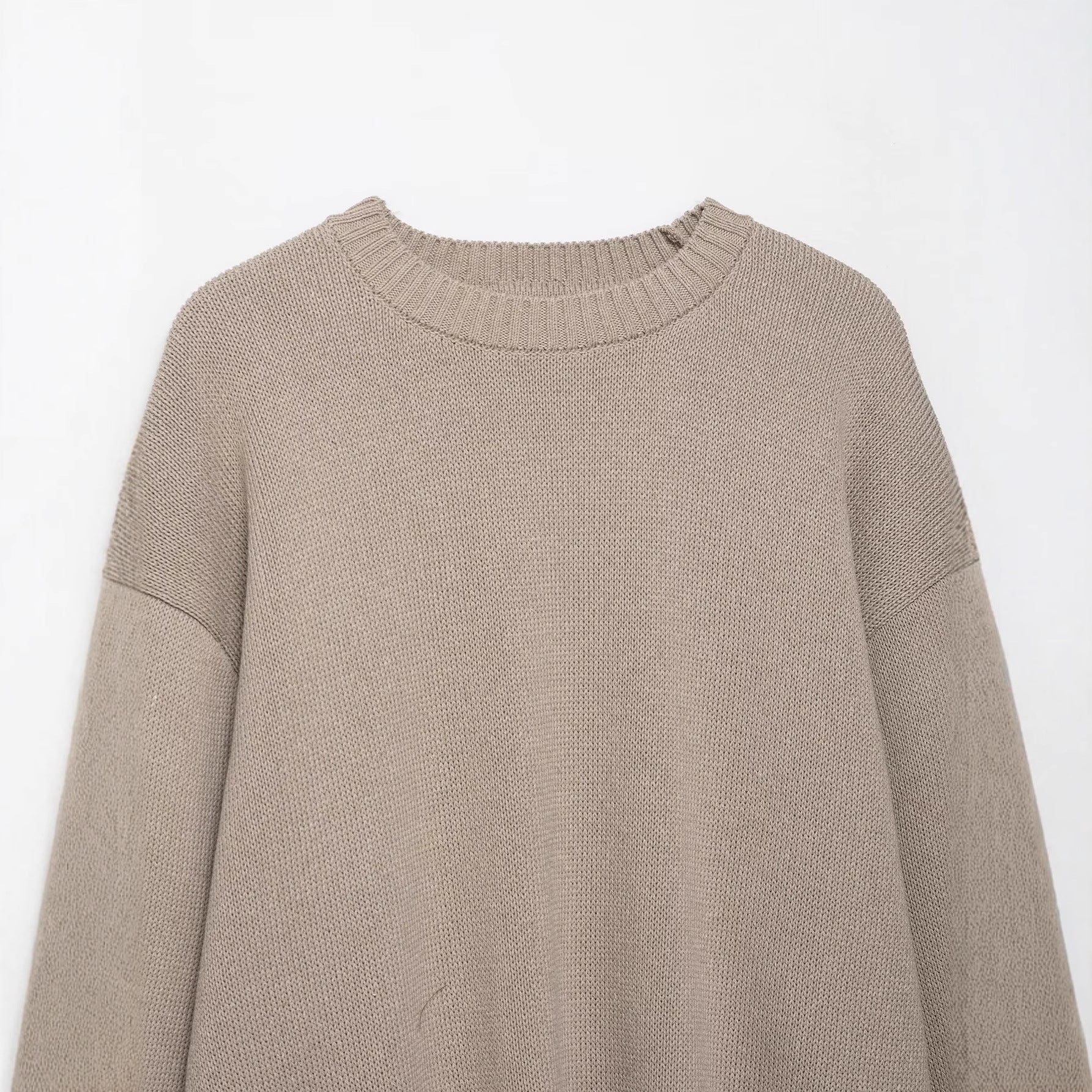 Long sleeved single breasted solid color pullover knitted sweater for women